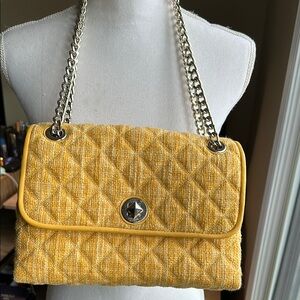 Kate Spade Yellow Quilted Fabric Women's Bag with adjustable chain straps.